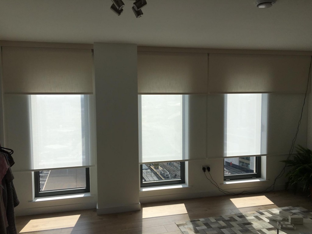 Electric double roller blinds fitted at a property in Stratford, London. For a free survey and estimate call us today.