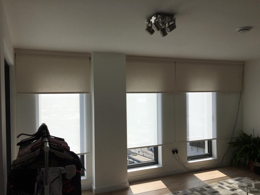 Electric double roller blinds fitted at a property in Stratford, London. For a free survey and estimate call us today.